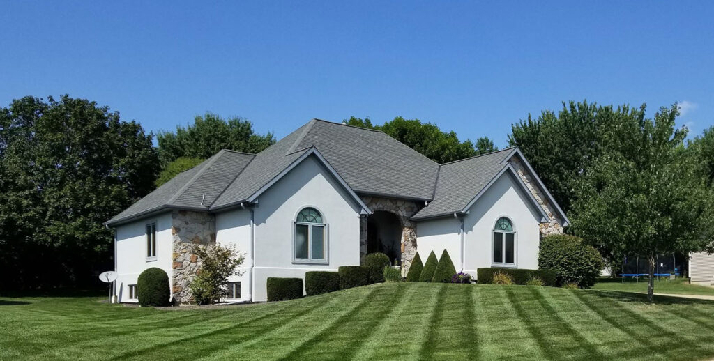 top-notch-turf-landscaped-home-front yard mowed grass